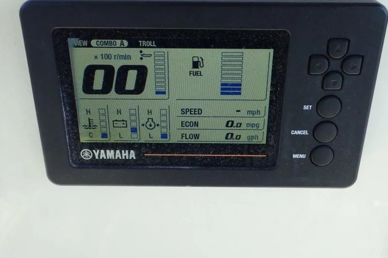 Slide: The Image of Yamaha display panel on 2023 Cobia 217 CC boat showing fuel and speed metrics. - 10
