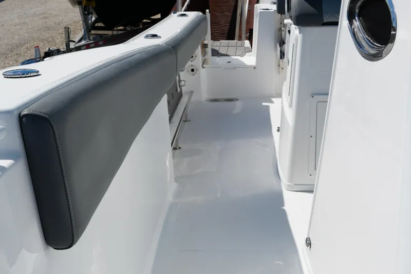 Slide: The Image of 2025 NauticStar 292 Legacy boat interior with sleek seating and modern design. - 20