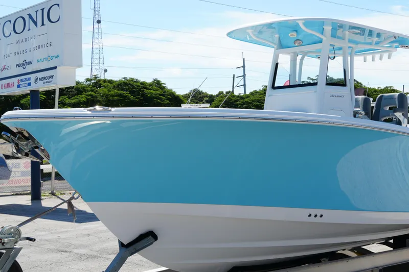 Slide: The Image of 2025 NauticStar 292 Legacy boat displayed at Iconic Marine dealership. - 5