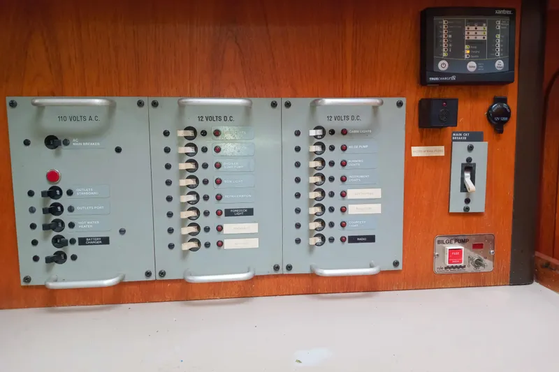 Slide: The Image of Electrical panel of a 1982 C&C Landfall 35 sailboat with AC and DC switches. - 12