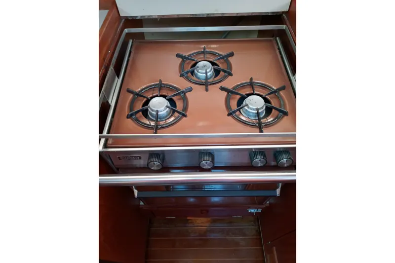 Slide: The Image of Three-burner stove in 1982 C&C Landfall 35 yacht kitchen. - 8