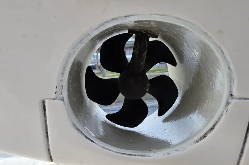 Slide: The Image of Bow thruster of a 2013 Grady-White Express 330 boat, close-up view. - 10