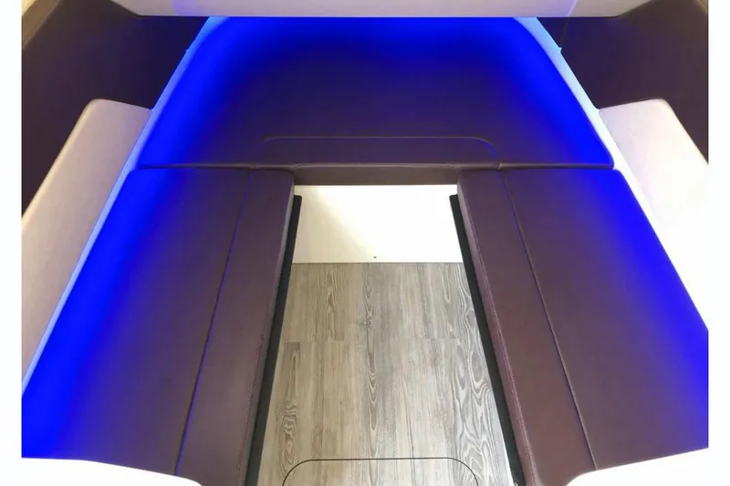Slide: The Image of Manufacturer Provided Image: 2024 Scout 330 LXF cabin with blue LED lighting and wooden flooring. - 29