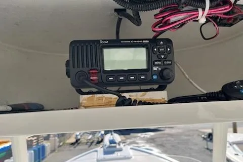 Slide: The Image of ICOM marine radio on 2020 Parker 2501 Center Console boat dashboard. - 7