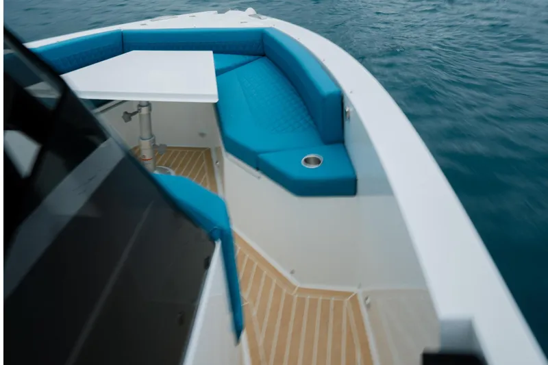 Slide: The Image of 2026 De Antonio Yachts D29 on clear blue water, aerial view. - 10