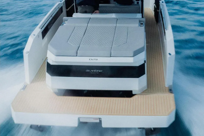 Slide: The Image of 2026 De Antonio Yachts D29 cruising on open water, aerial view. - 5