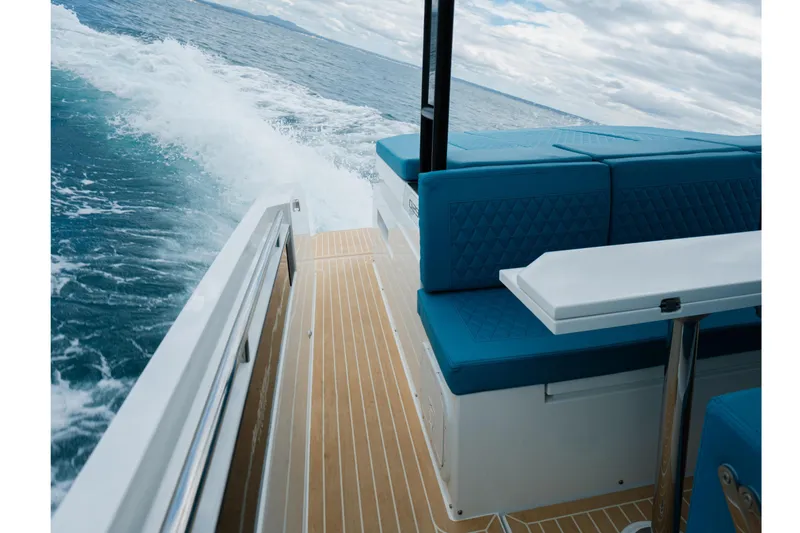Slide: The Image of 2026 De Antonio Yachts D29 cruising on sparkling blue ocean waters. - 7