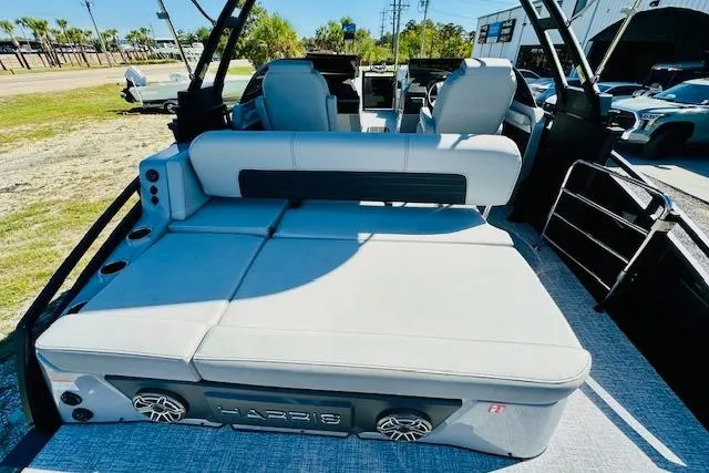 Slide: The Image of 2026 Harris Solstice DC 250 boat interior with spacious seating and modern design. - 25