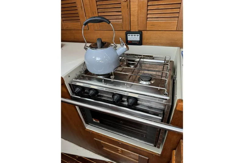 Slide: The Image of Stainless steel stove with kettle in a 1984 Barberis 38 yacht kitchen. - 10