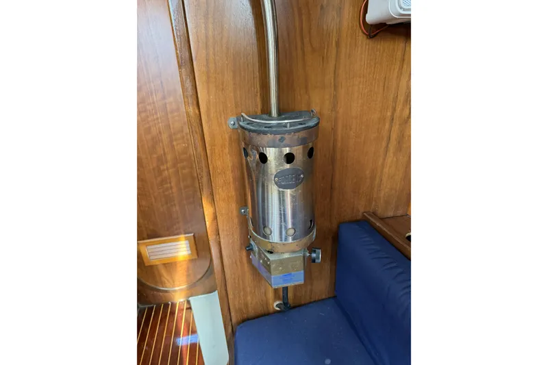 Slide: The Image of Vintage Barberis 38 yacht interior with a mounted metal heater, 1984 model. - 21