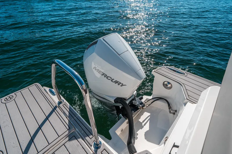 Slide: The Image of Aquila 32 Sport 2022 boat with Mercury outboard engine on sparkling water. - 10