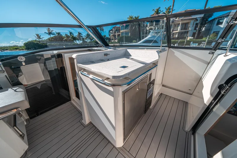 Slide: The Image of 2022 Aquila 32 Sport yacht interior with sleek design and modern amenities. - 23