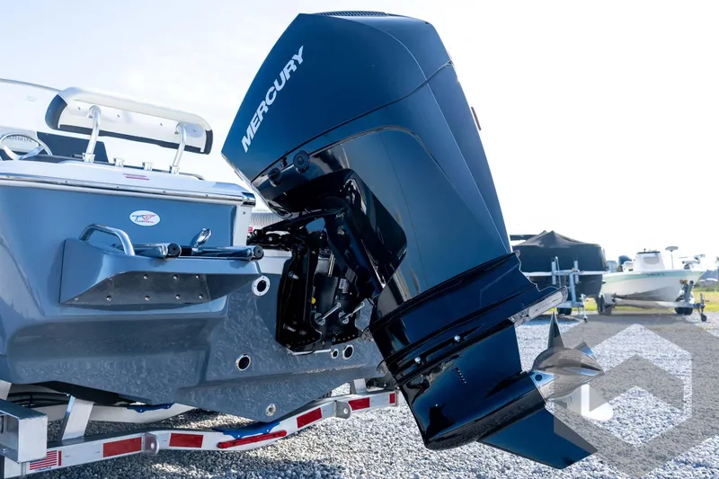 Slide: The Image of 2026 Tidewater 2110 Bay Max boat with Mercury outboard engine on a trailer. - 19