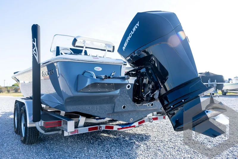 Slide: The Image of 2026 Tidewater 2110 Bay Max boat with Mercury engine on a trailer. - 20