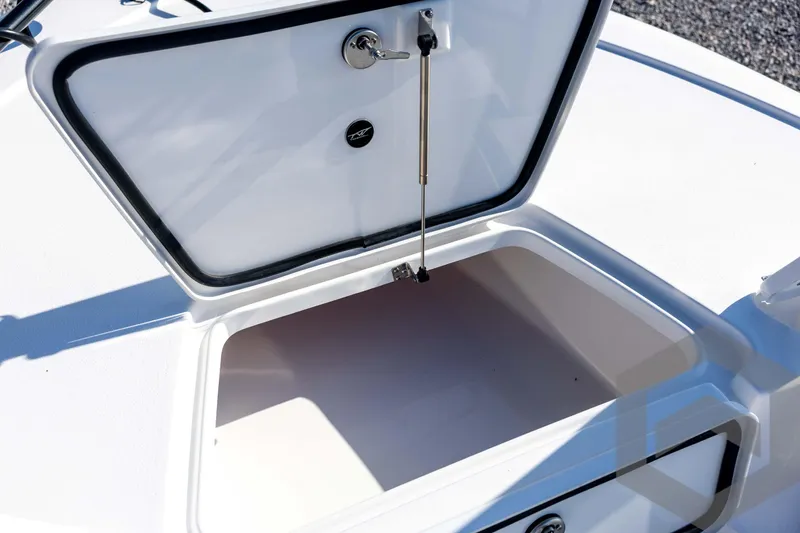 Slide: The Image of Open storage compartment on 2026 Tidewater 2110 Bay Max boat. - 42
