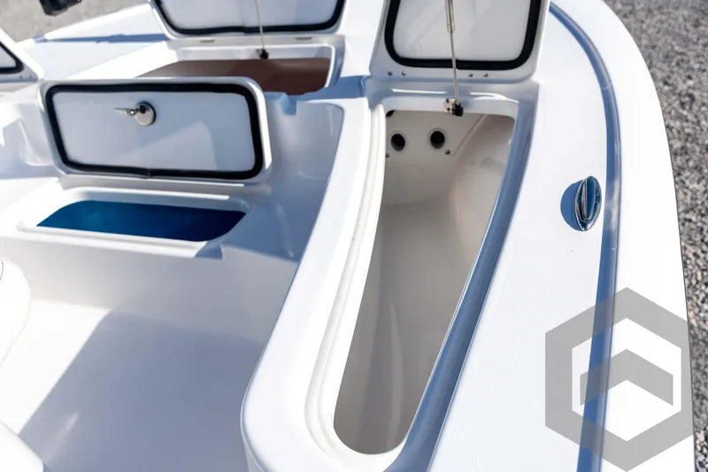 Slide: The Image of 2026 Tidewater 2110 Bay Max boat storage compartments open on deck. - 43