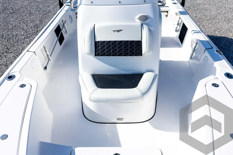Slide: The Image of 2026 Tidewater 2110 Bay Max boat interior with white seating and sleek design. - 45