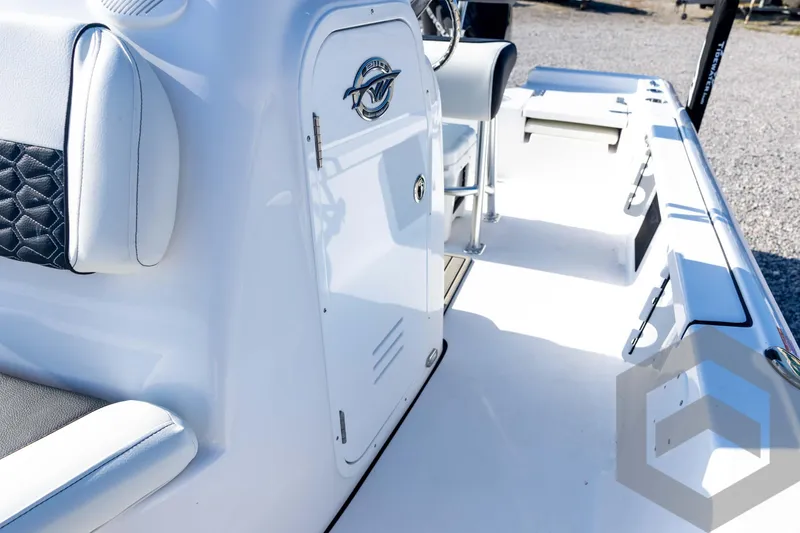 Slide: The Image of 2026 Tidewater 2110 Bay Max boat interior with sleek white seating and modern design. - 46