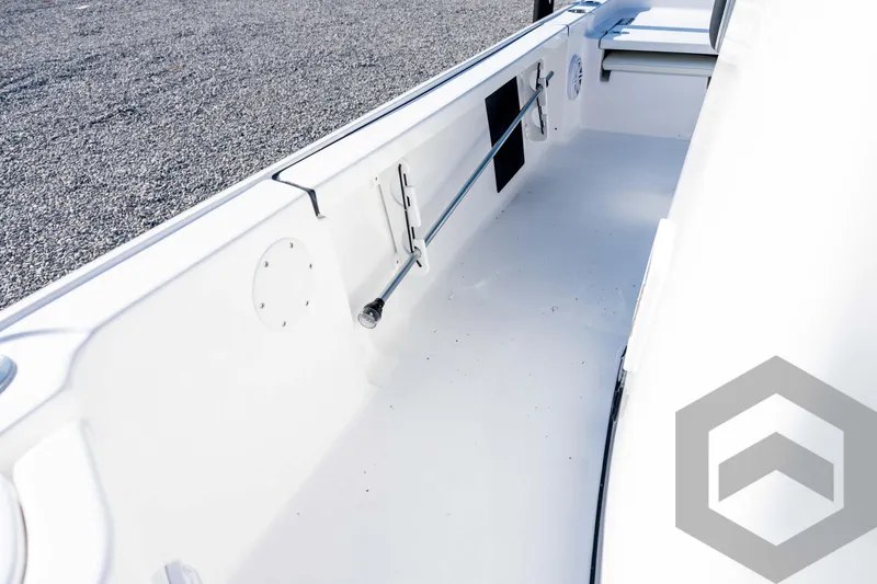 Slide: The Image of 2026 Tidewater 2110 Bay Max boat interior, showcasing sleek white design and spacious layout. - 48