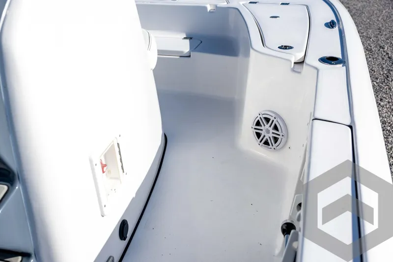 Slide: The Image of 2026 Tidewater 2110 Bay Max boat interior with speaker and storage compartments. - 50