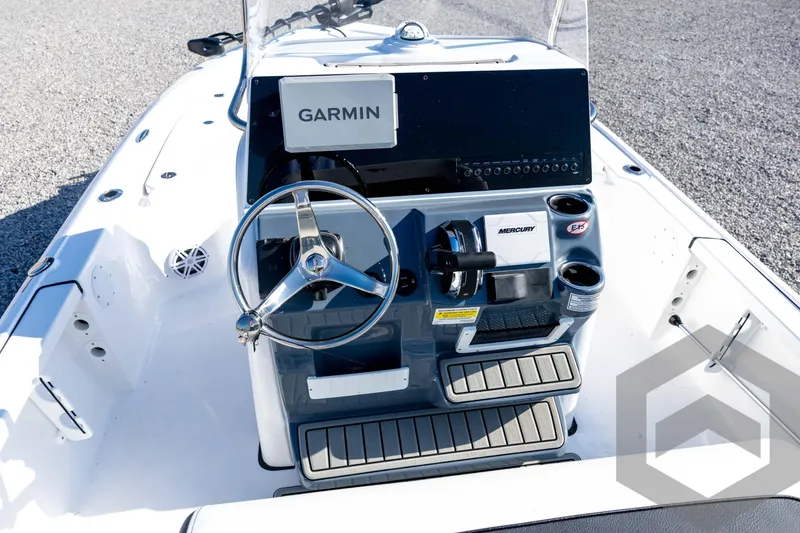 Slide: The Image of 2026 Tidewater 2110 Bay Max boat console with Garmin and Mercury controls. - 52