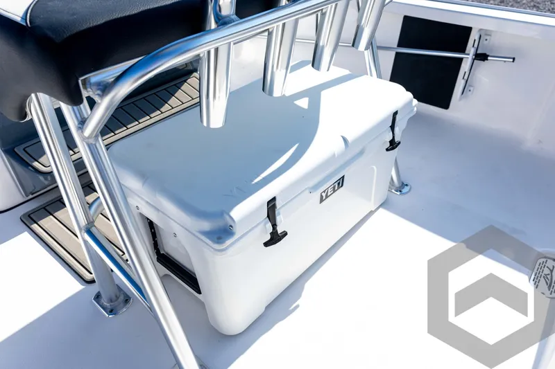 Slide: The Image of 2026 Tidewater 2110 Bay Max boat interior with YETI cooler and seating. - 63
