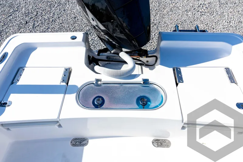 Slide: The Image of 2026 Tidewater 2110 Bay Max boat stern with motor and storage compartments. - 64