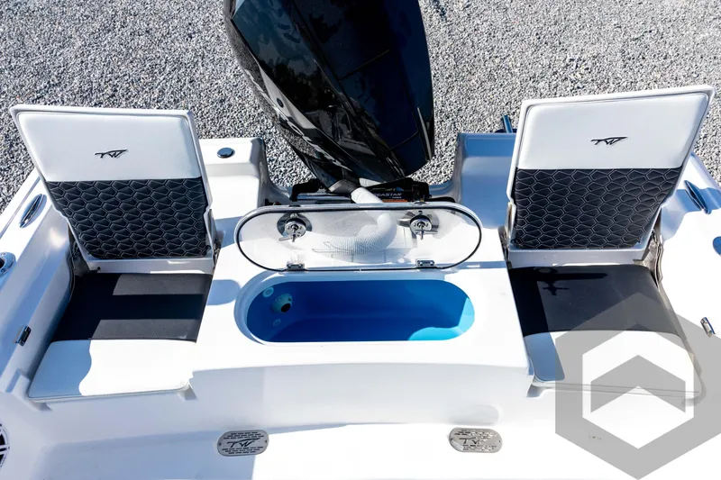 Slide: The Image of 2026 Tidewater 2110 Bay Max boat interior with seating and livewell. - 65