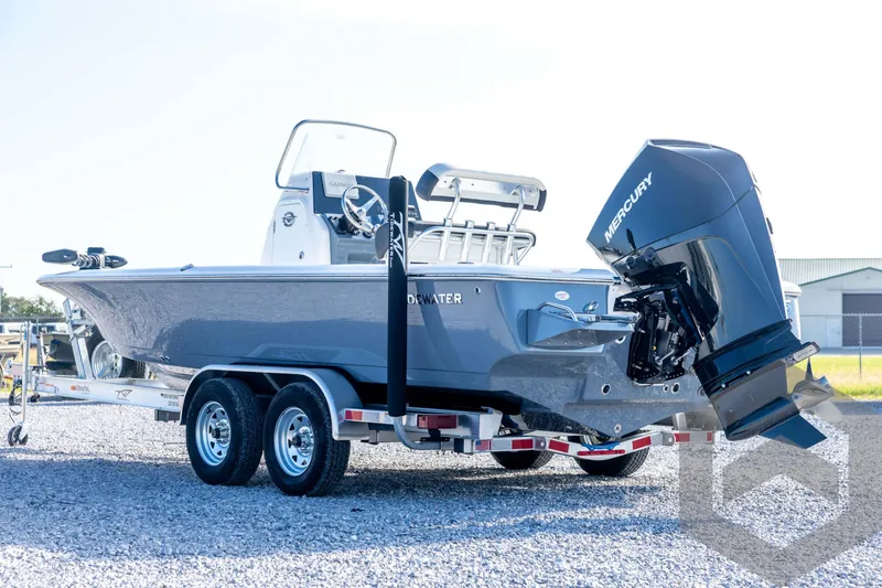 Slide: The Image of 2026 Tidewater 2110 Bay Max boat with Mercury engine on trailer. - 7