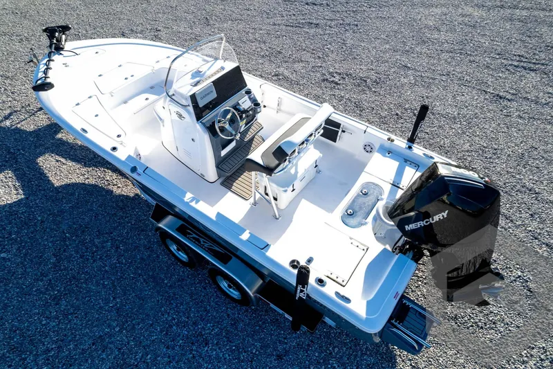 Slide: The Image of 2026 Tidewater 2110 Bay Max boat with Mercury engine on a trailer. - 73