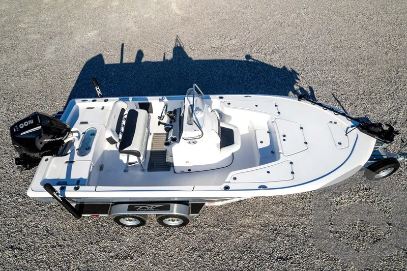 Slide: The Image of 2026 Tidewater 2110 Bay Max boat on trailer, aerial view, parked on gravel. - 78