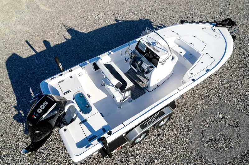 Slide: The Image of 2026 Tidewater 2110 Bay Max boat on trailer, aerial view, sleek design. - 79