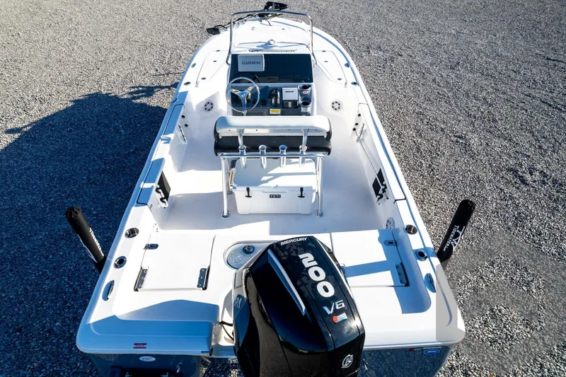 Slide: The Image of 2026 Tidewater 2110 Bay Max boat with Mercury V6 engine, viewed from above. - 80