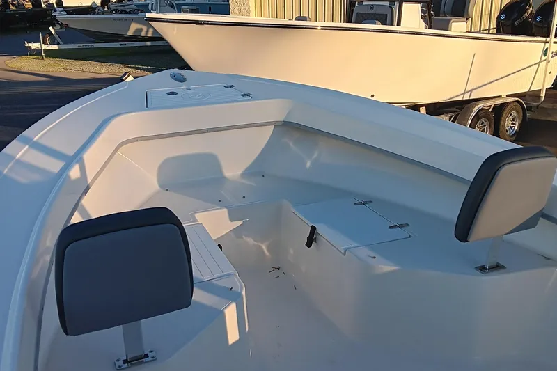 Slide: The Image of 2026 May-Craft 238 CC boat interior with seating and storage compartments. - 10