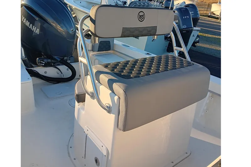 Slide: The Image of 2026 May-Craft 238 CC boat interior with Yamaha engine and cushioned seating. - 12