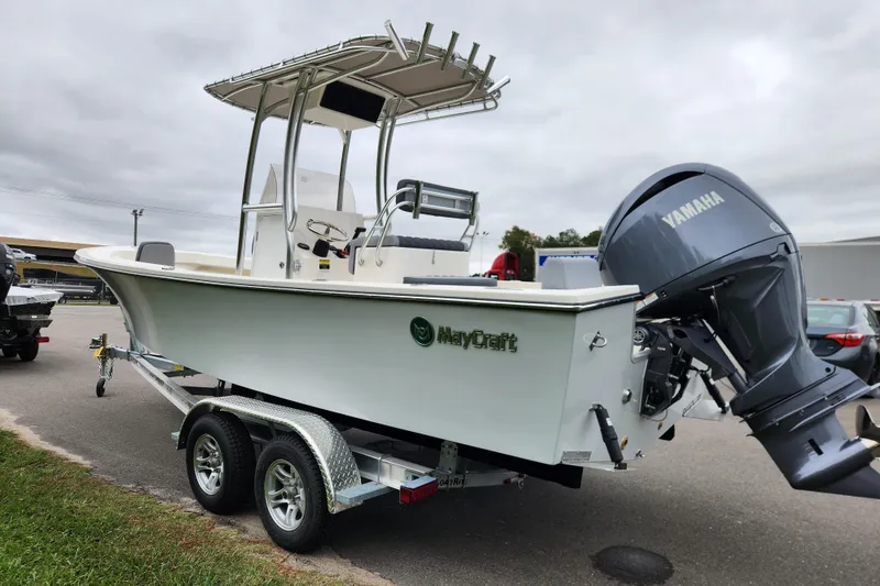 Slide: The Image of 2026 May-Craft 238 CC boat on trailer with Yamaha outboard motor. - 4
