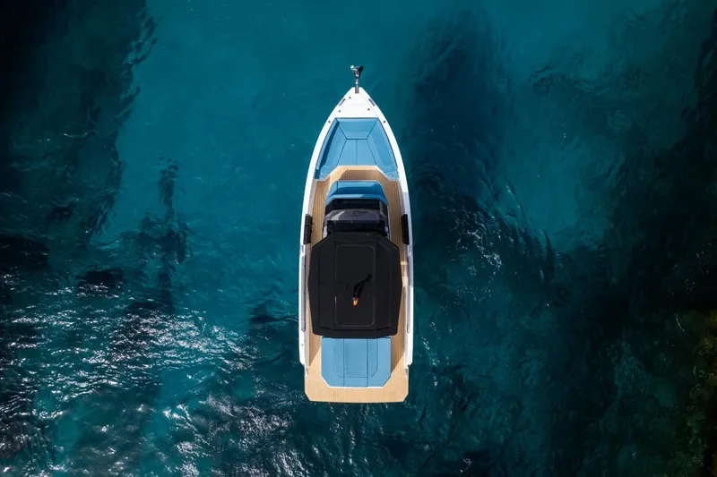 Slide: The Image of Aerial view of 2026 De Antonio Yachts D29 on clear blue water. - 11