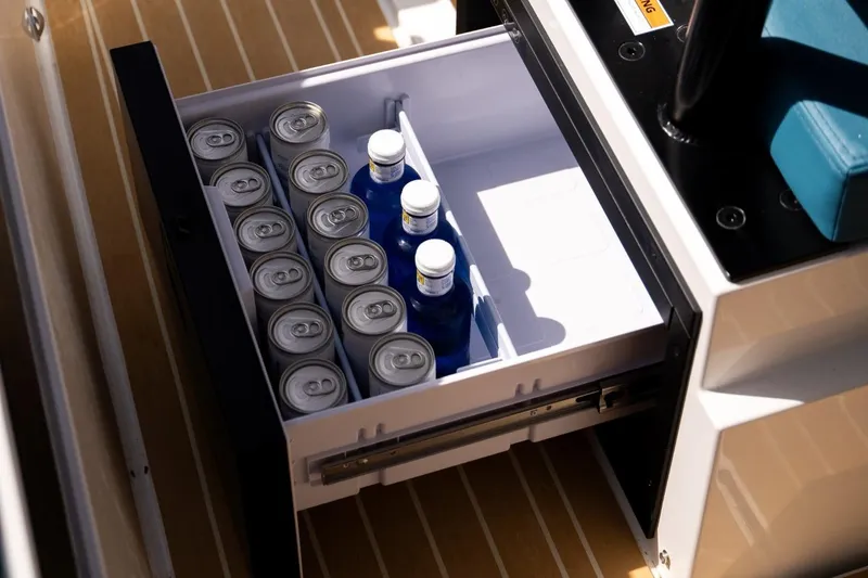 Slide: The Image of Drawer fridge on 2026 De Antonio Yachts D29, stocked with cans and bottles. - 19
