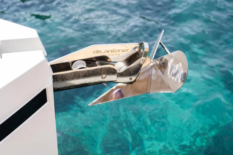 Slide: The Image of Anchor detail of 2026 De Antonio Yachts D29 against clear blue water. - 25