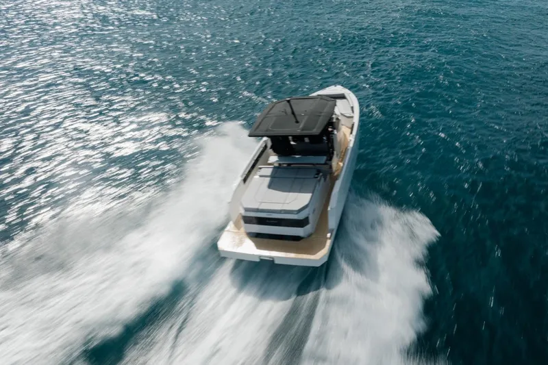 Slide: The Image of 2026 De Antonio Yachts D29 cruising on open water, showcasing sleek design and performance. - 9