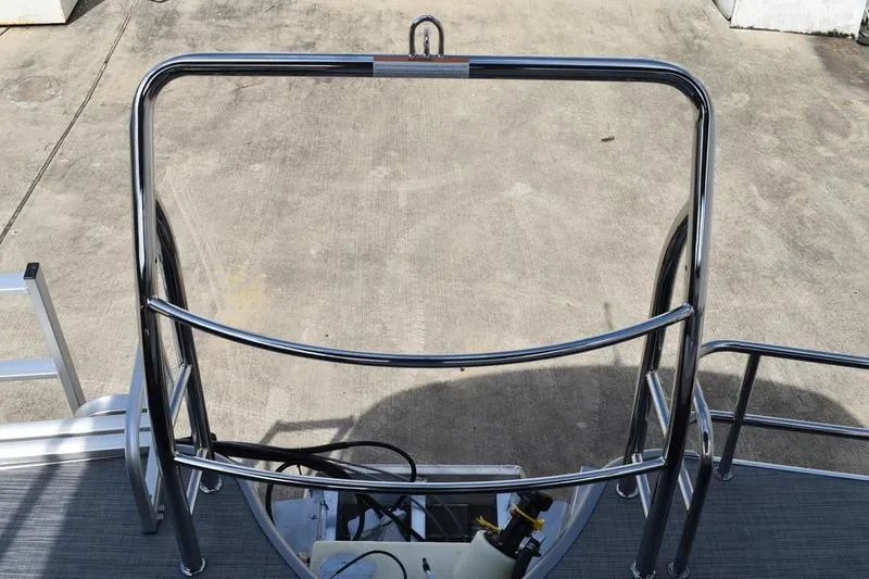 Slide: The Image of 2023 Lowe SS 230 DV boat with stainless steel railing and deck view. - 1