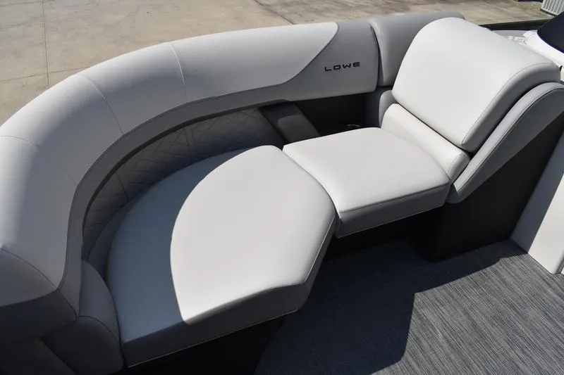 Slide: The Image of Luxurious seating on 2023 Lowe SS 230 DV boat, featuring sleek, modern design. - 15