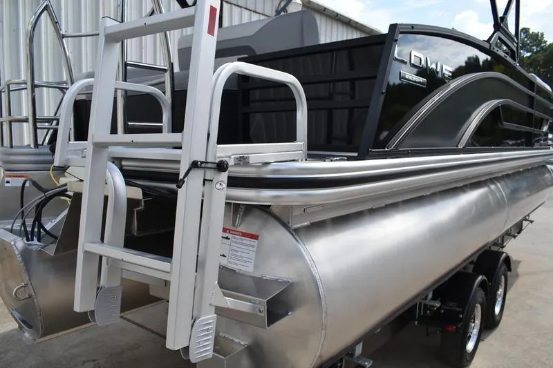 Slide: The Image of 2023 Lowe SS 230 DV pontoon boat with ladder and sleek design. - 9