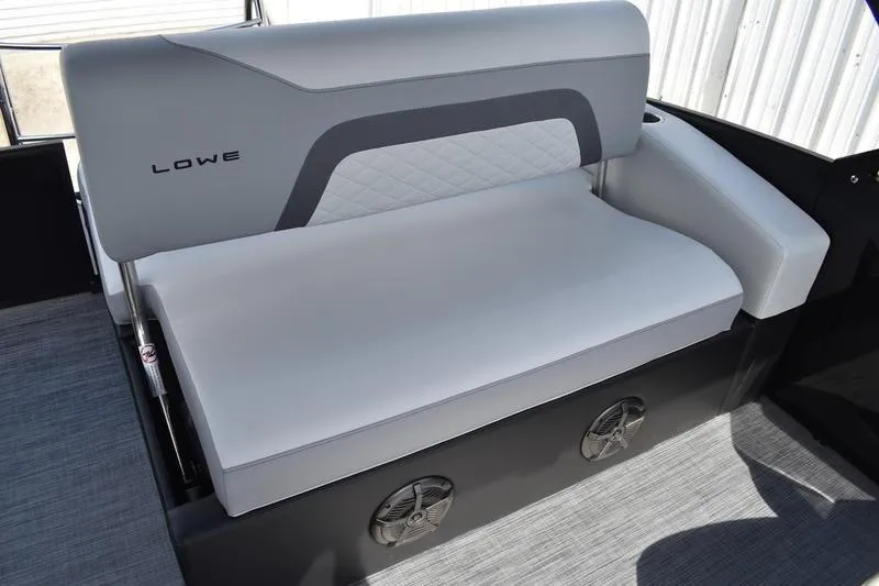 Slide: The Image of 2023 Lowe SS 230 DV boat seat with gray upholstery and integrated speakers. - 35