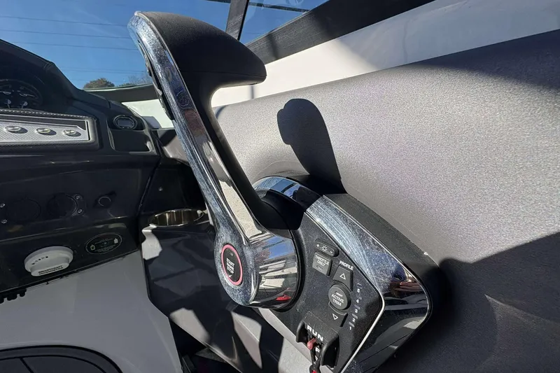 Slide: The Image of Throttle control of 2023 Monterey 238SS Super Sport boat, featuring sleek design and modern controls. - 13
