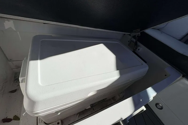 Slide: The Image of Storage compartment in 2023 Monterey 238SS Super Sport boat. - 16