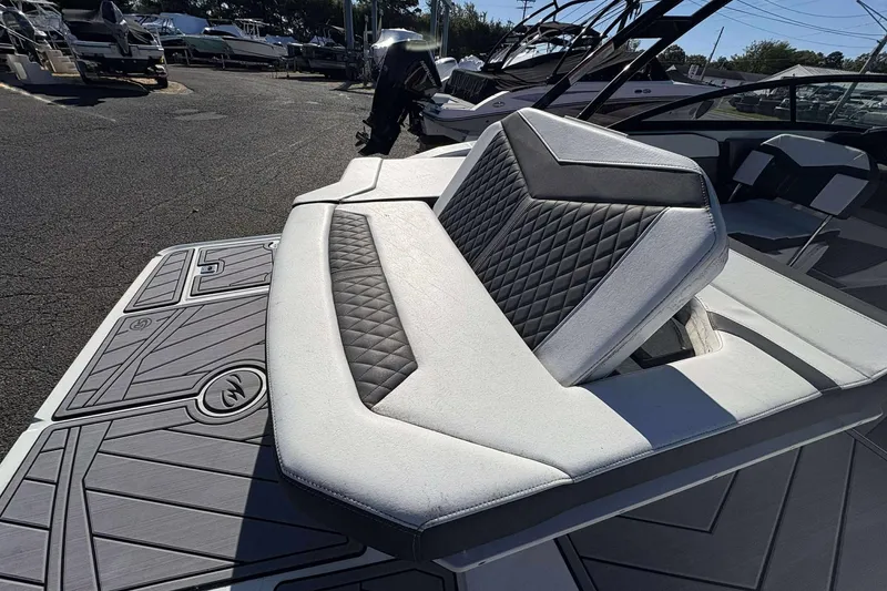 Slide: The Image of 2023 Monterey 238SS Super Sport boat with stylish seating and modern design. - 21