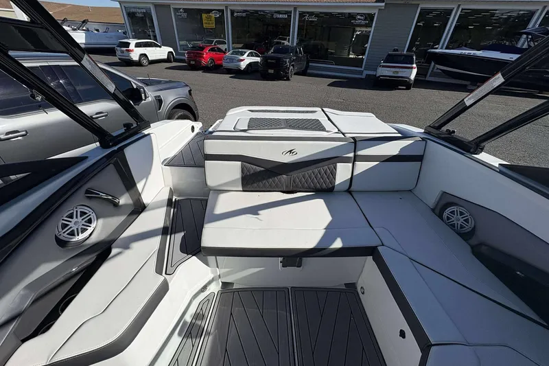 Slide: The Image of 2023 Monterey 238SS Super Sport boat interior with sleek seating and modern design. - 24
