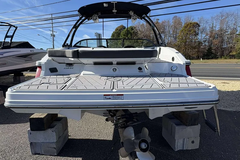 Slide: The Image of 2023 Monterey 238SS Super Sport boat on display, rear view with swim platform. - 26