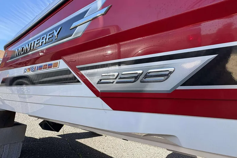 Slide: The Image of 2023 Monterey 238SS Super Sport boat with red and white detailing. - 6